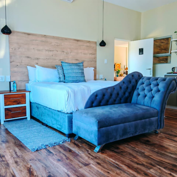 Lilitha accommodation bedroom with upholstered bed